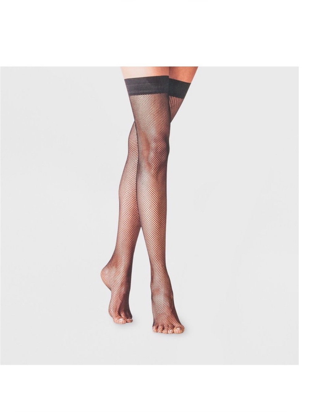 Women’s fishnet thigh highs